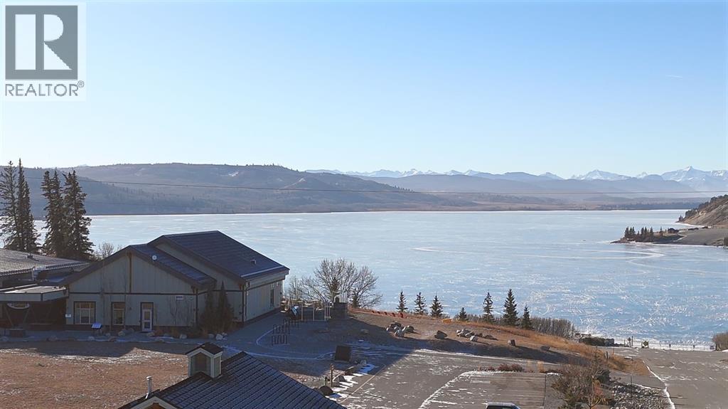 624 Cottageclub Bend, Rural Rocky View County, Alberta T4C 1B1 - Photo 8 - A2287874