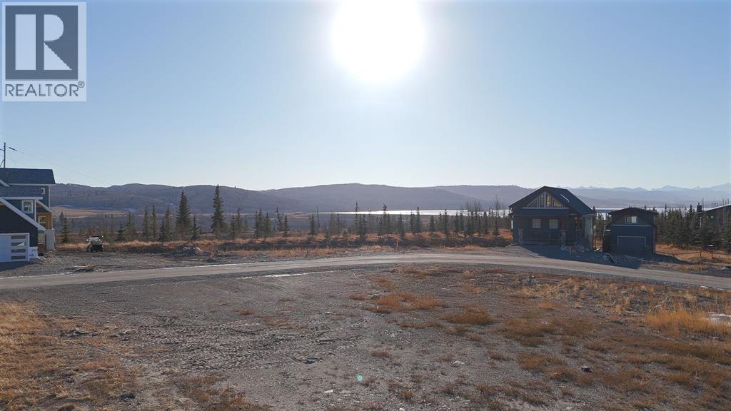 624 Cottageclub Bend, Rural Rocky View County, Alberta T4C 1B1 - Photo 3 - A2287874