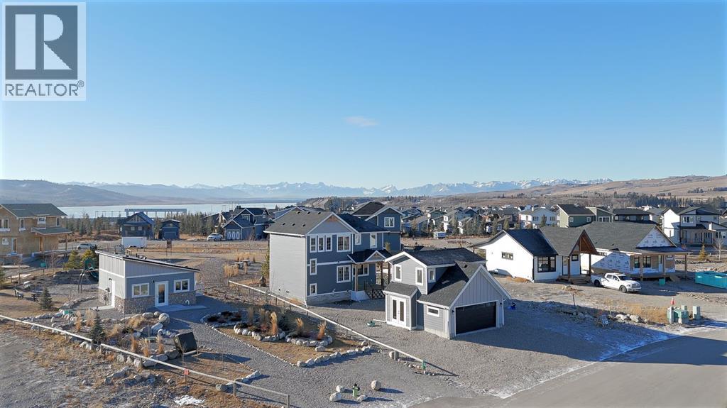 624 Cottageclub Bend, Rural Rocky View County, Alberta T4C 1B1 - Photo 10 - A2287874