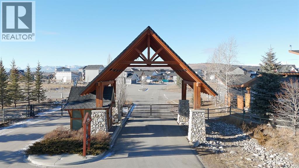 624 Cottageclub Bend, Rural Rocky View County, Alberta T4C 1B1 - Photo 2 - A2287874