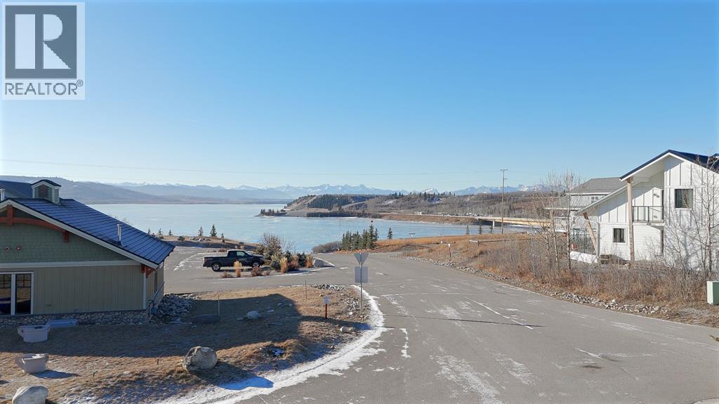 624 Cottageclub Bend, Rural Rocky View County, Alberta T4C 1B1 - Photo 9 - A2287874