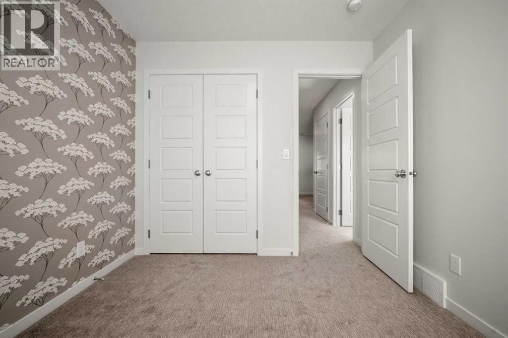 110 Wolf Creek Rise Se, Calgary, Alberta  T2X 4X1 - Photo 24 - A2285199