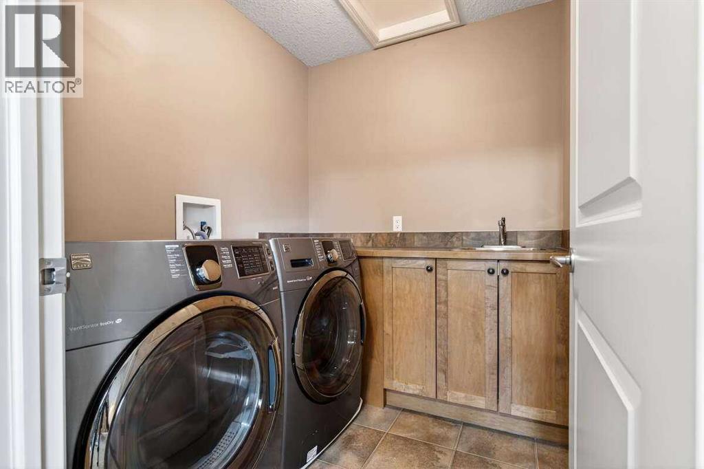 55 Sheep River Cove, Okotoks, Alberta  T1S 2T4 - Photo 32 - A2284784