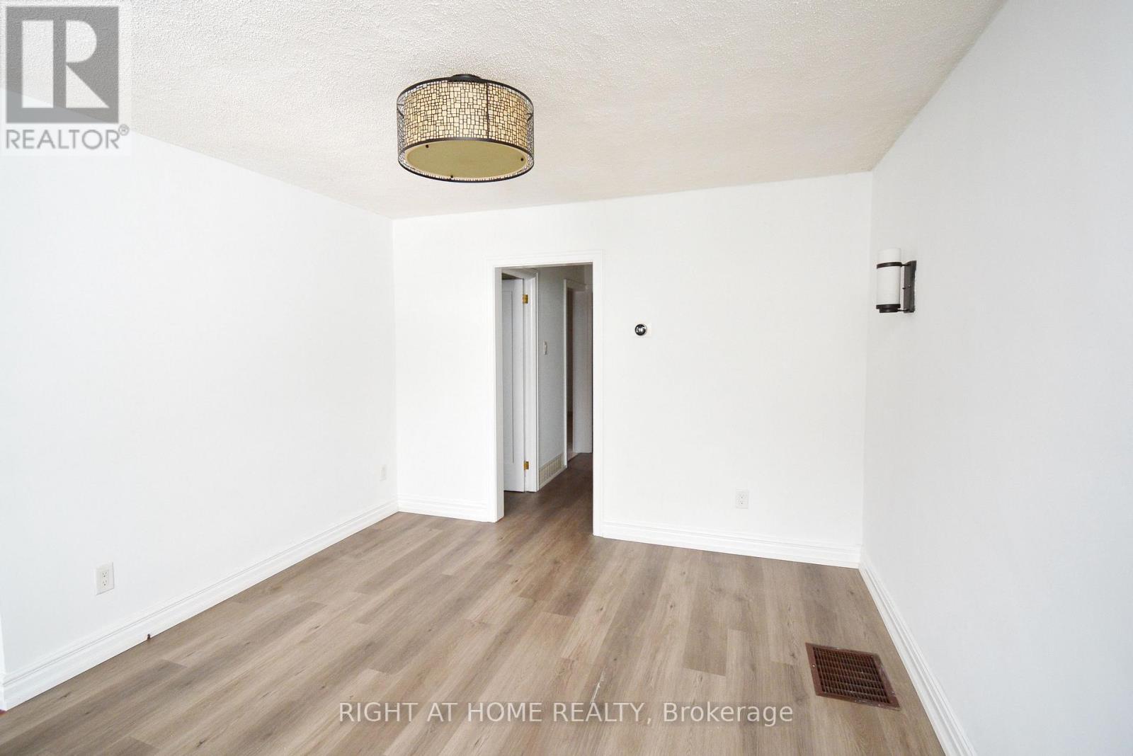 22 Landour Avenue, Toronto, Ontario  M6M 4J4 - Photo 4 - W12816404