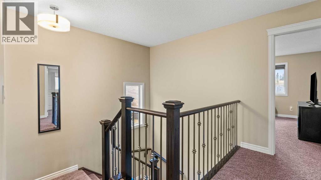 153 Heritage Bay, Cochrane, Alberta  T4C 0L5 - Photo 20 - A2288162