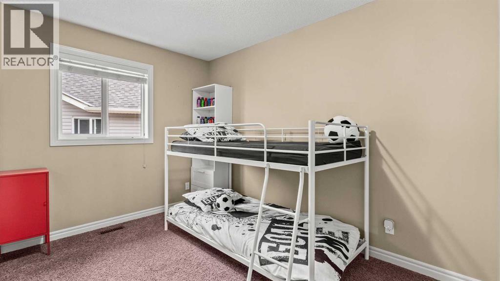 153 Heritage Bay, Cochrane, Alberta  T4C 0L5 - Photo 31 - A2288162