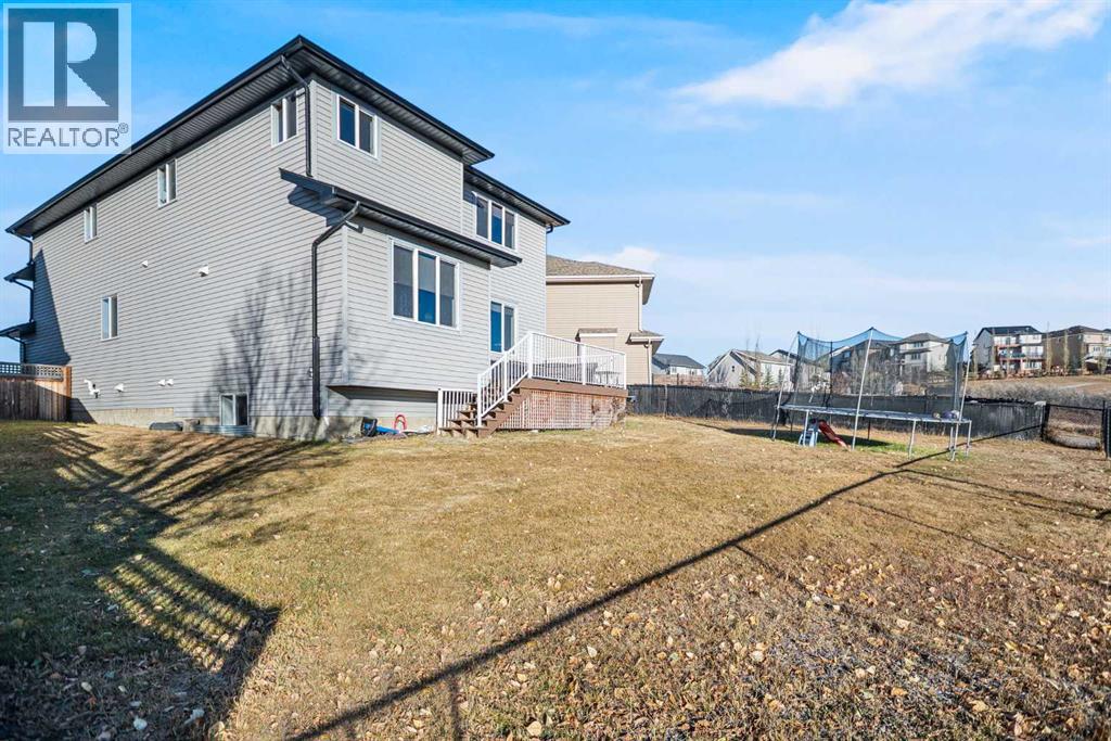 153 Heritage Bay, Cochrane, Alberta  T4C 0L5 - Photo 45 - A2288162