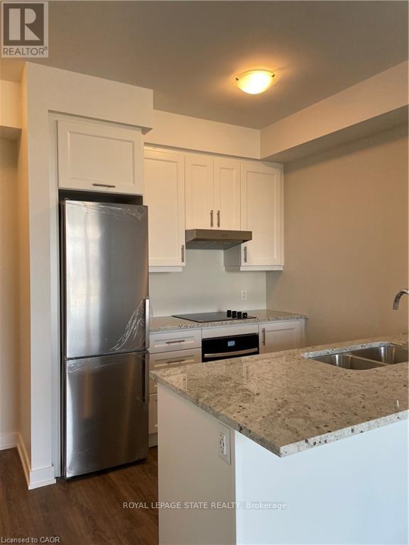 309 - 600 North Service Road, Hamilton, Ontario  L8E 5A7 - Photo 2 - X12816698