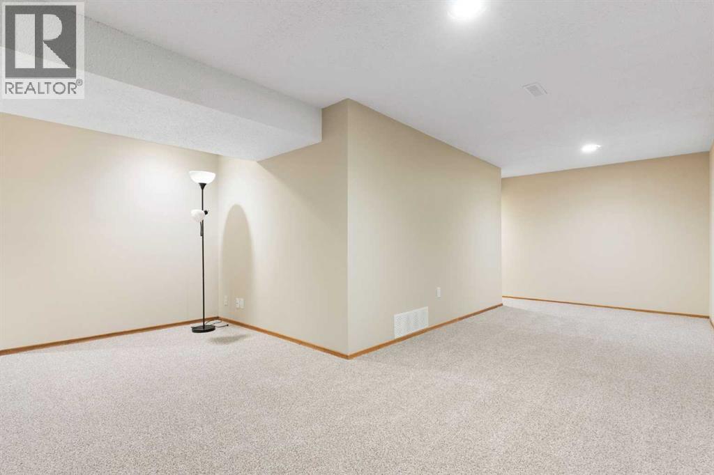 123 Glacier Drive Sw, Calgary, Alberta  T3E 5A3 - Photo 22 - A2288194