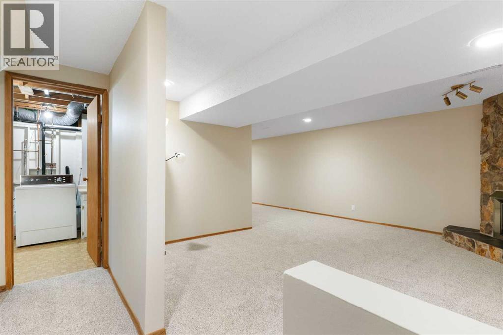 123 Glacier Drive Sw, Calgary, Alberta  T3E 5A3 - Photo 25 - A2288194