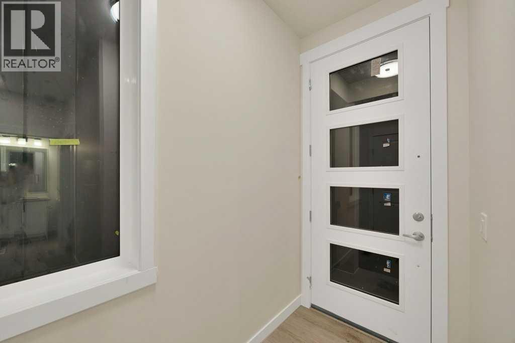 7 Chelsea Port Link, Chestermere, Alberta  T1X 3H4 - Photo 4 - A2280523