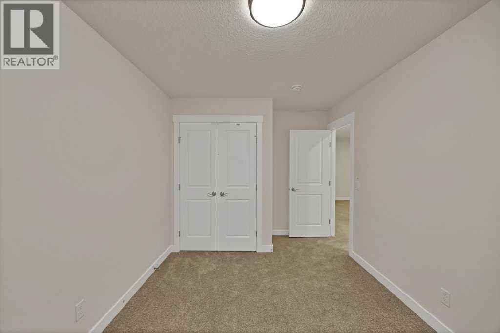 7 Chelsea Port Link, Chestermere, Alberta  T1X 3H4 - Photo 30 - A2280523