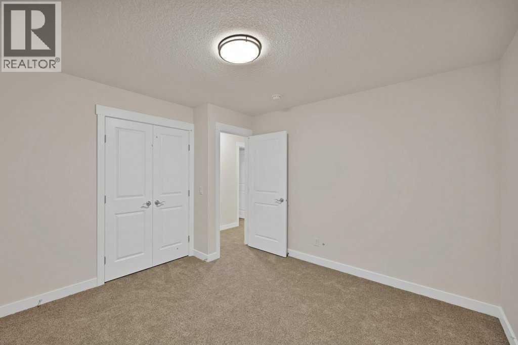 7 Chelsea Port Link, Chestermere, Alberta  T1X 3H4 - Photo 34 - A2280523