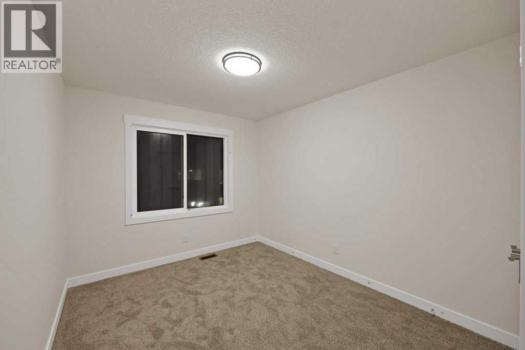 7 Chelsea Port Link, Chestermere, Alberta  T1X 3H4 - Photo 31 - A2280523