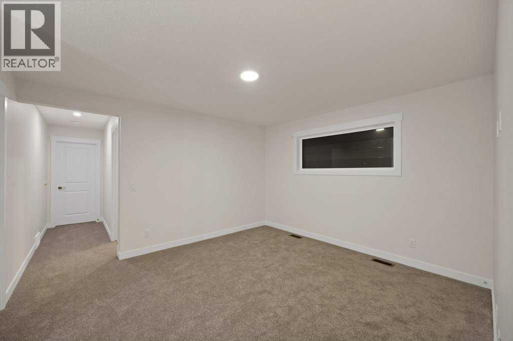 7 Chelsea Port Link, Chestermere, Alberta  T1X 3H4 - Photo 20 - A2280523