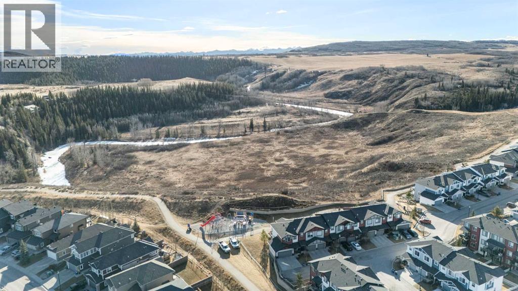 1403 Jumping Pound Common, Cochrane, Alberta T4C 2L1 - Photo 35 - A2285401