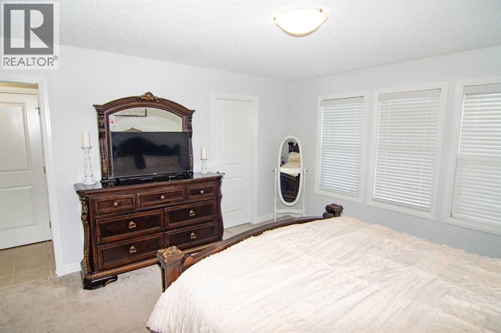 149 Cimarron Vista Crescent, Okotoks, Alberta  T1S 0K3 - Photo 24 - A2276499