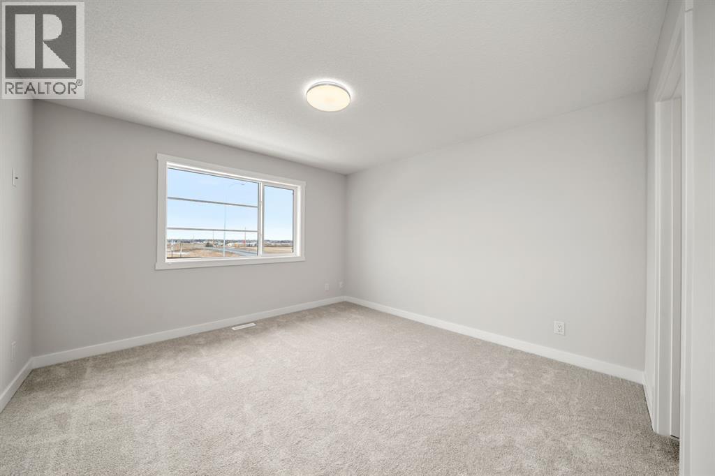 17 Sora Gate Se, Calgary, Alberta  T3S 0M6 - Photo 7 - A2282949
