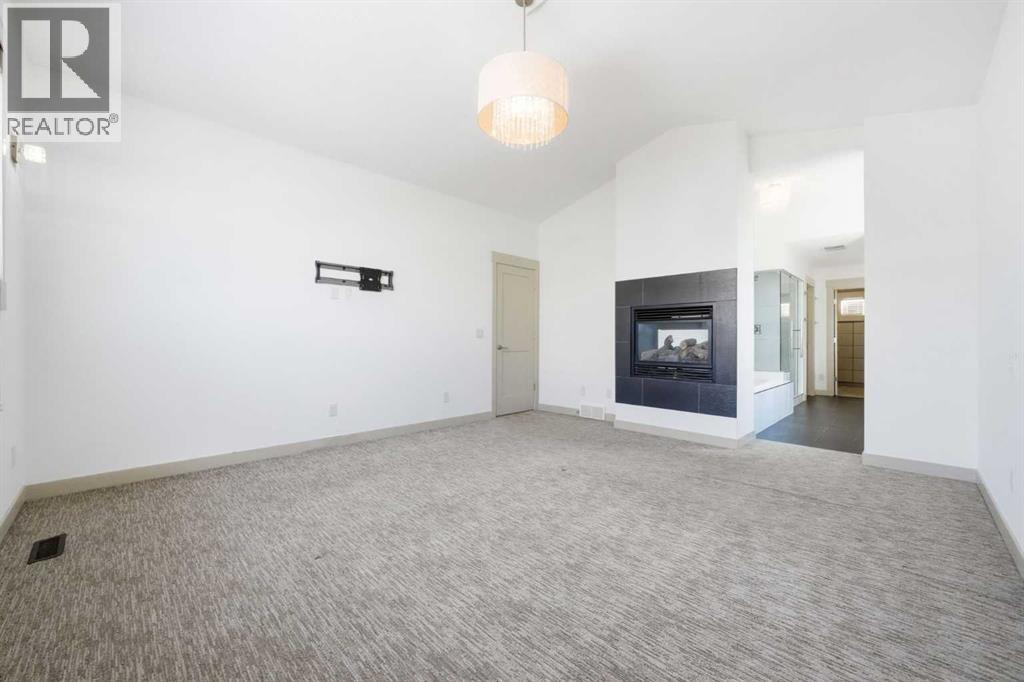 428 Aspen Glen Place Sw, Calgary, Alberta  T3H 0E9 - Photo 21 - A2288704