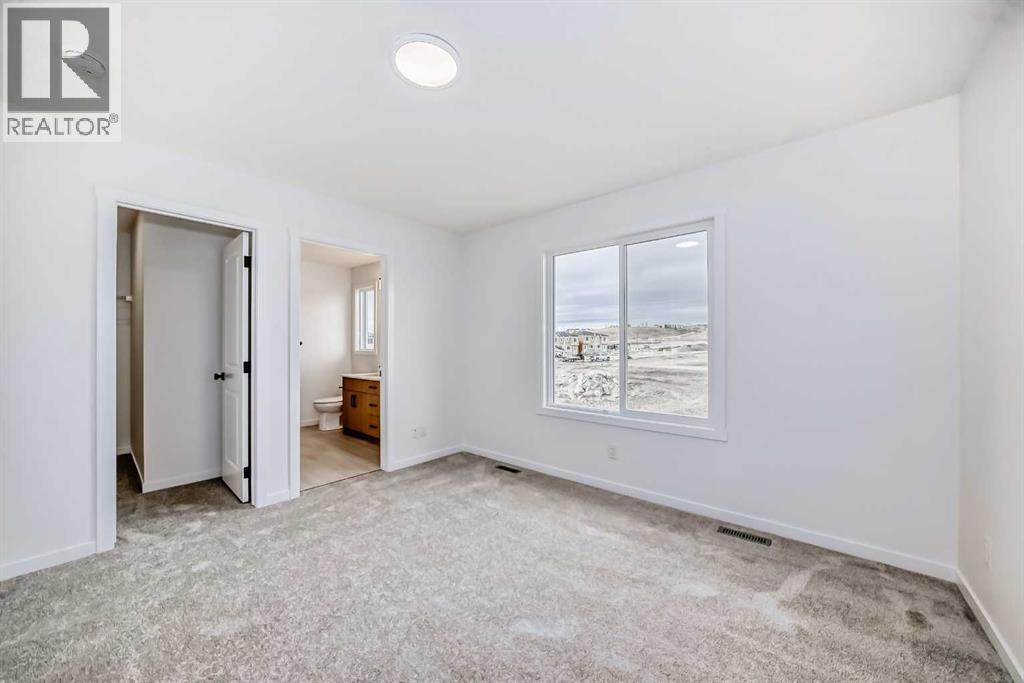 406 Heartland Way, Cochrane, Alberta  T4C 3E5 - Photo 19 - A2267807