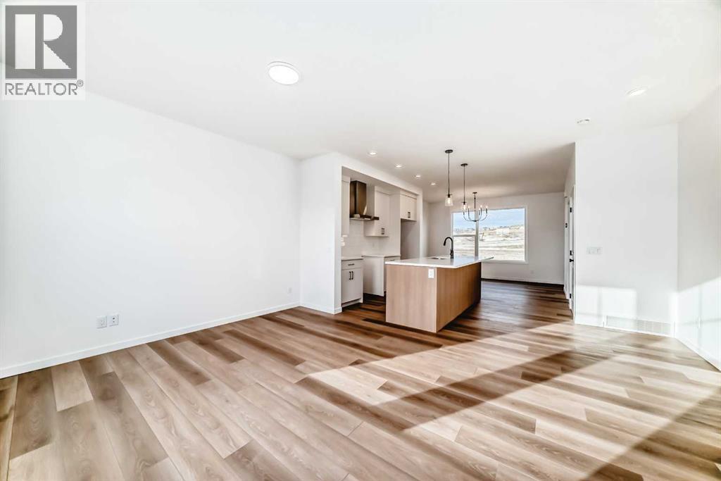 406 Heartland Way, Cochrane, Alberta  T4C 3E5 - Photo 7 - A2267807