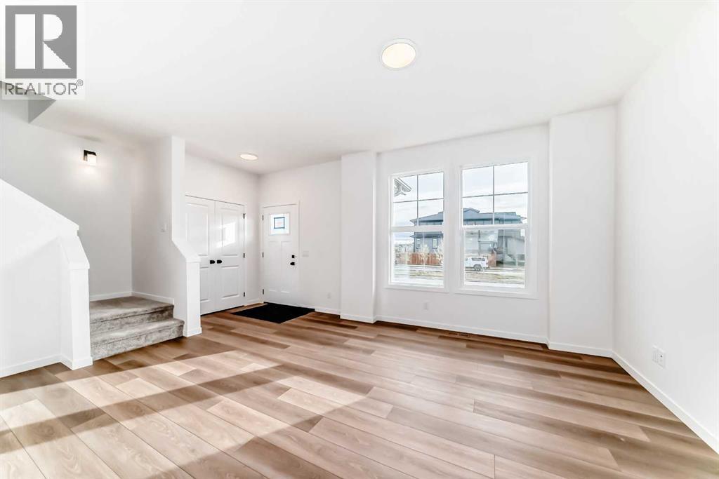 406 Heartland Way, Cochrane, Alberta  T4C 3E5 - Photo 9 - A2267807