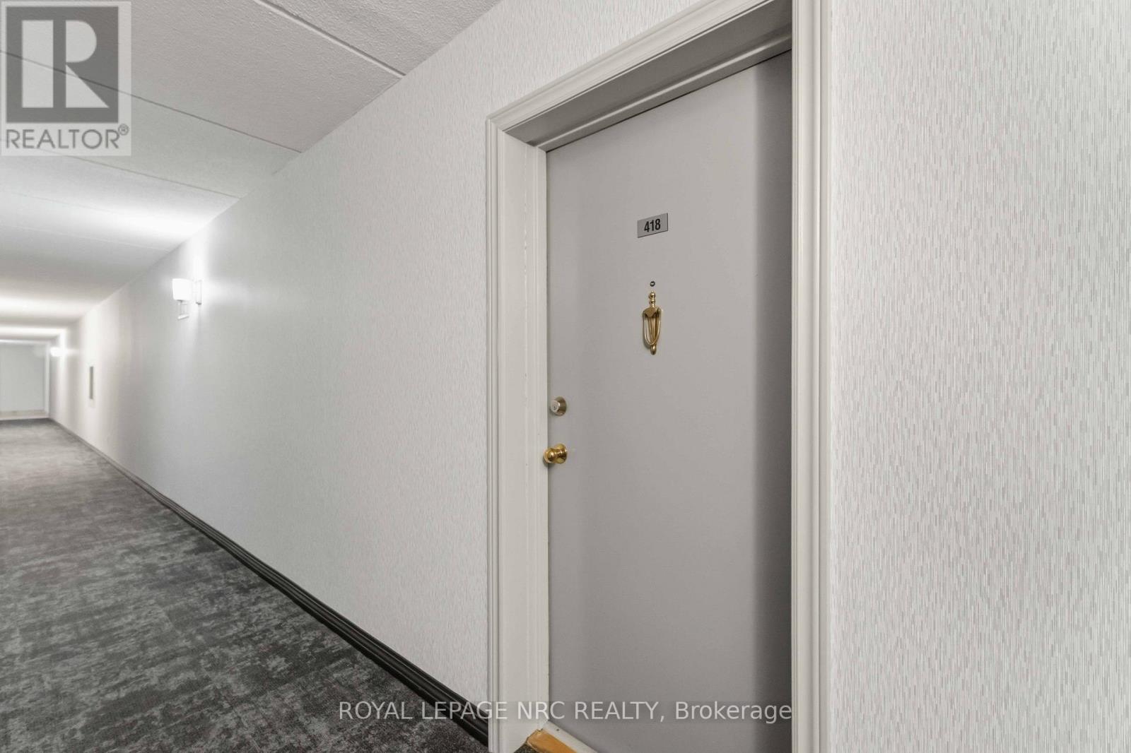 418 - 198 Scott Street, St. Catharines, Ontario  L2N 5T3 - Photo 3 - X12815770