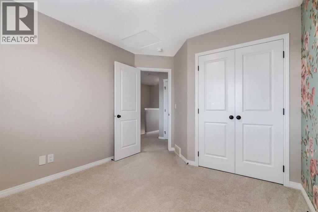 730 Belmont Drive Sw, Calgary, Alberta  T2X 4H3 - Photo 24 - A2286204