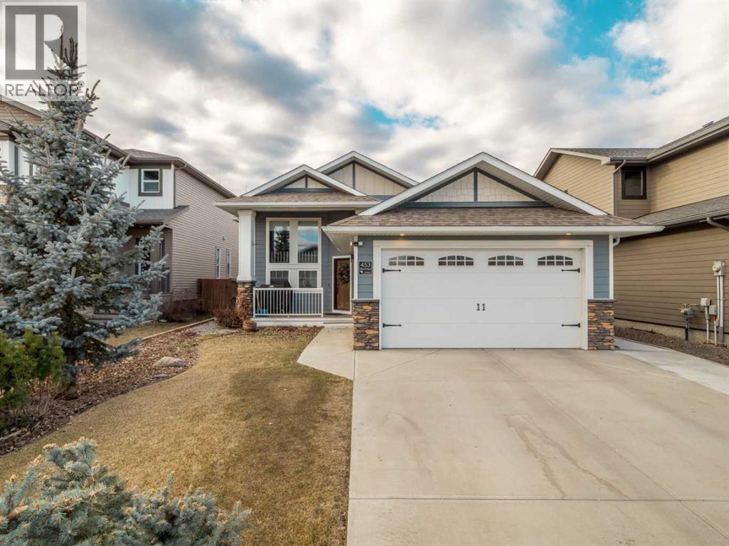 Welcome to 453 Westgate Crescent, a beautifully updated bi-level in the desirable Westgate Landing community of Coaldale. Located in a quiet, family-friendly neighbourhood across from a playground and just minutes from amenities and Land-O-Lakes Golf & Country Club, this home offers comfort, convenience, and style.  The bright, open-concept main floor features a chef-inspired kitchen with a gas cooktop, built-in appliances, quartz countertops, and a spacious breakfast bar—perfect for entertaining or everyday living. The fully developed layout includes 3 bedrooms plus a versatile office that can easily serve as a 4th bedroom, along with 3 bathrooms including a private ensuite.  Enjoy year-round relaxation in the heated and air-conditioned sunroom overlooking a beautifully landscaped backyard with raised planters, a concrete patio, and a gazebo. Additional features include enclosed storage beneath the sunroom and a heated garage.  A bright, modern home in one of Coaldale’s most sought-after neighbourhoods—don’t miss this opportunity. (id:48254)