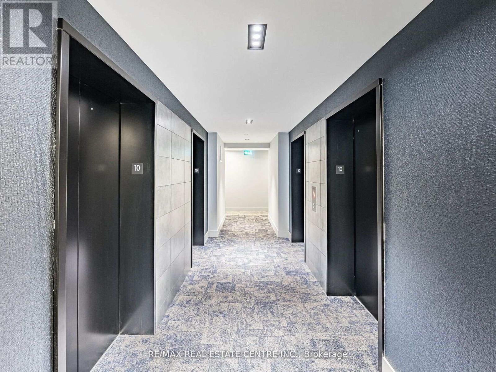 4130 Parkside Village Drive W, Mississauga, Ontario  L5M 0X8 - Photo 3 - W12818066