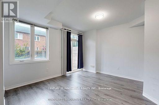 10 Hyderabad Lane, Markham, Ontario  L4E 0T8 - Photo 4 - N12818934