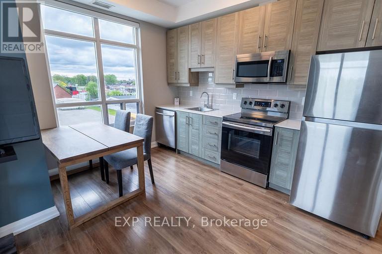 402 - 6289 Mcleod Road, Niagara Falls (Arad/fallsview), Ontario  L2G 3E9 - Photo 3 - X12819464