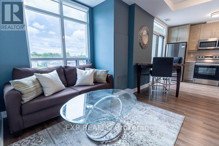 402 - 6289 Mcleod Road, Niagara Falls (Arad/fallsview), Ontario  L2G 3E9 - Photo 4 - X12819464