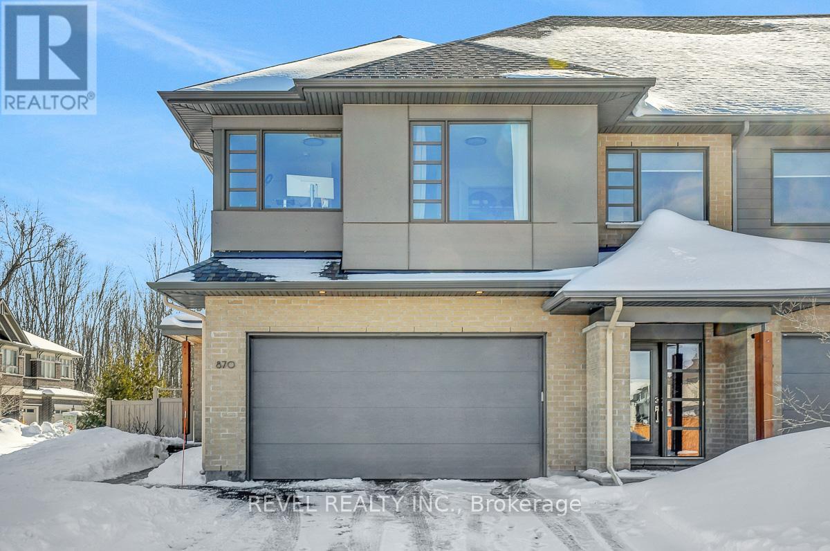 Agent OH Feb 26 12pm-1pm, Mar 1 2pm-4pm. Welcome to an exceptional opportunity in Riverside South - a rare 4-bedroom, 3.5 bathroom corner-lot townhome with a highly sought after 2 car garage and over 2600 sq/ft of living space. This home is designed for the way modern families live and truly offers the space and flexibility that's nearly impossible to find in a townhouse. Step inside to a bright, open-concept main floor where natural light pours through oversized windows, creating a warm and inviting atmosphere. The beautifully appointed kitchen is the heart of the home - perfect for morning coffee at the island, family dinners, and effortless entertaining. The seamless flow between living and dining spaces makes gatherings feel easy and connected. Upstairs, four generously sized bedrooms and 3 full bathrooms provide room for growing families, guests, or dedicated home office space. Expansive primary bedroom with 5 piece ensuite and secondary suite on this level offer comfort, convenience, and a touch of everyday luxury - an ideal setup for multi-generational living or hosting overnight guests with ease. The finished basement expands your living space even further, perfect for a cozy movie night, playroom and fitness area. With a bathroom rough-in already in place, a future in-law suite is possible. Outside, enjoy the added privacy and yard space of a premium corner lot, fully fenced and ready for summer barbecues, kids at play, or relaxing evenings. Set in one of Ottawa's most desirable family-friendly communities, close to parks, schools, trails, and everyday amenities, this home blends space, practicality, and lifestyle in one rare package. (id:48254)