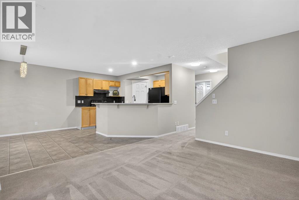 147 Everstone Rise Sw, Calgary, Alberta  T2Y 4J7 - Photo 7 - A2274354