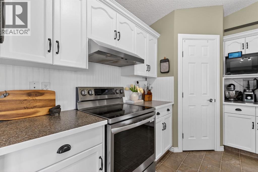 108 Cimarron Grove Circle, Okotoks, Alberta  T1S 2L9 - Photo 7 - A2286644