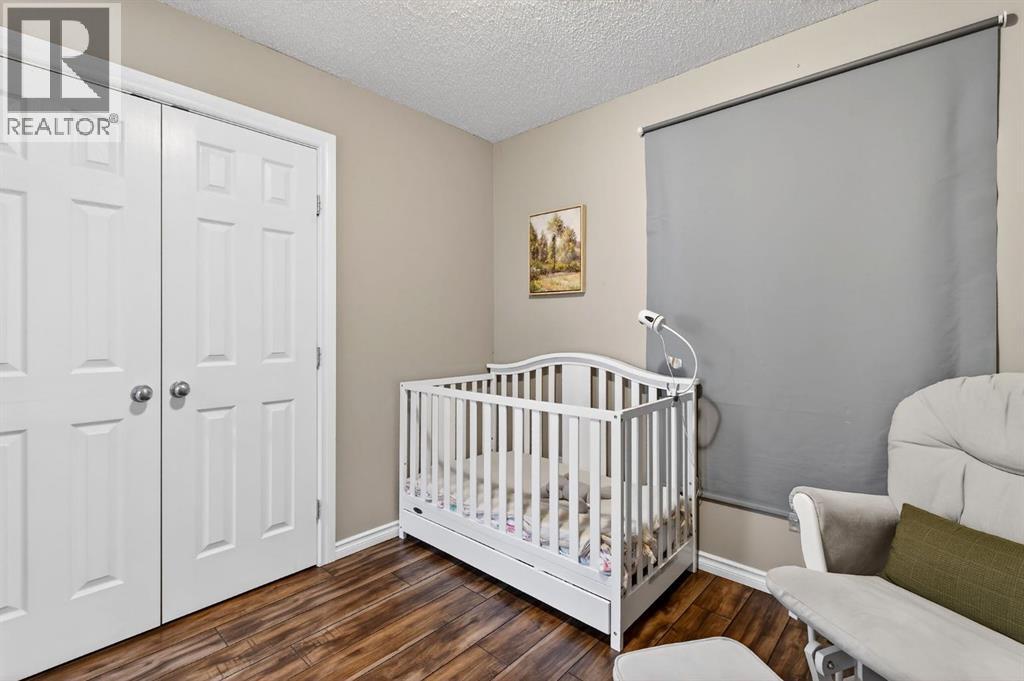 108 Cimarron Grove Circle, Okotoks, Alberta  T1S 2L9 - Photo 21 - A2286644