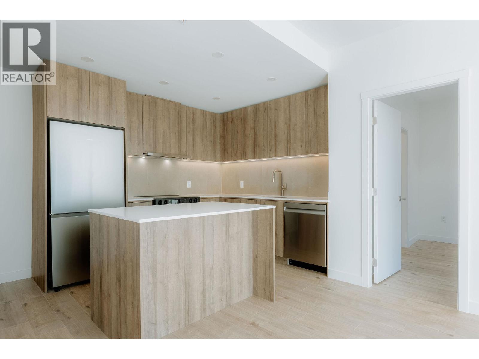 305 3594 Malsum Drive, North Vancouver, British Columbia  V7G 0B4 - Photo 1 - R3089808