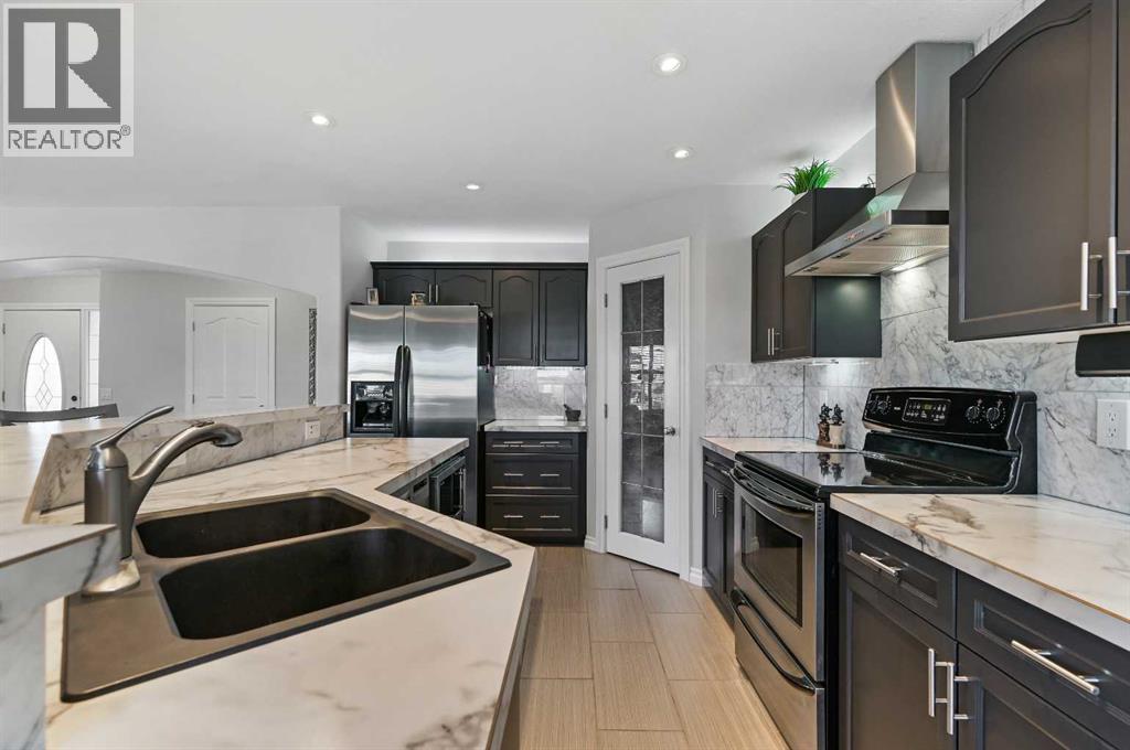 60 Canoe Cove Sw, Airdrie, Alberta  T4B 2Z5 - Photo 10 - A2283904