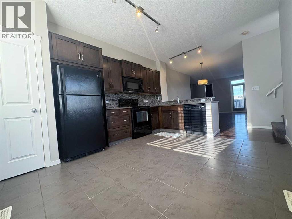 2202, 125 Panatella Way Nw, Calgary, Alberta  T3K 0R9 - Photo 4 - A2282996