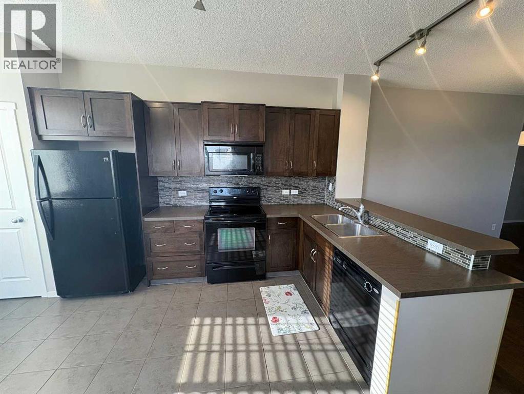 2202, 125 Panatella Way Nw, Calgary, Alberta  T3K 0R9 - Photo 8 - A2282996