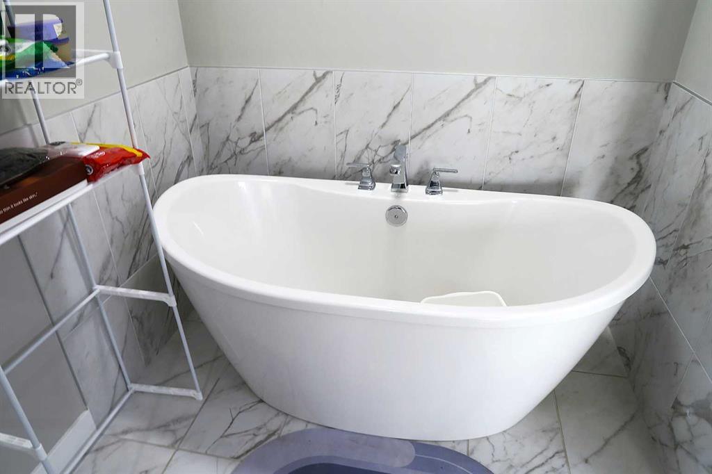 240 Creekstone Row Sw, Calgary, Alberta  T2X 4Y5 - Photo 20 - A2285154