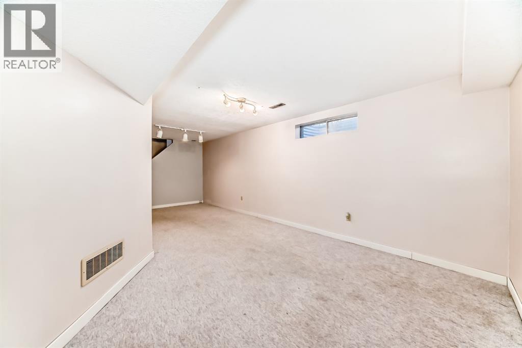 8007 Ranchview Drive Nw, Calgary, Alberta  T3G 1S7 - Photo 27 - A2281459