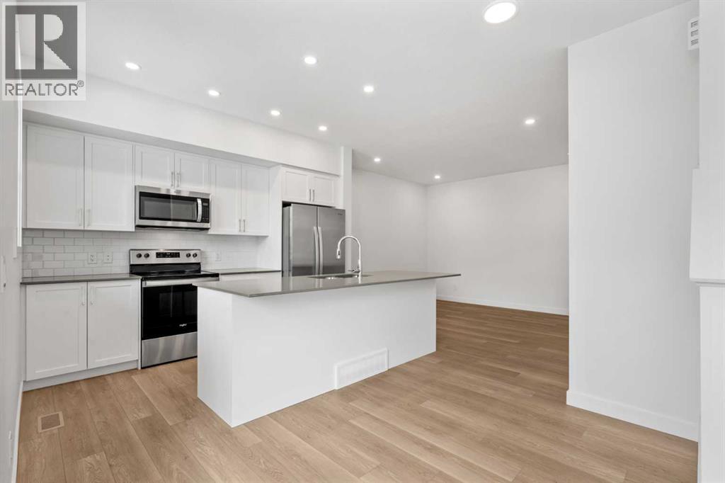 303, 65 Belvedere Point Se, Calgary, Alberta  T2A 7G5 - Photo 3 - A2288302