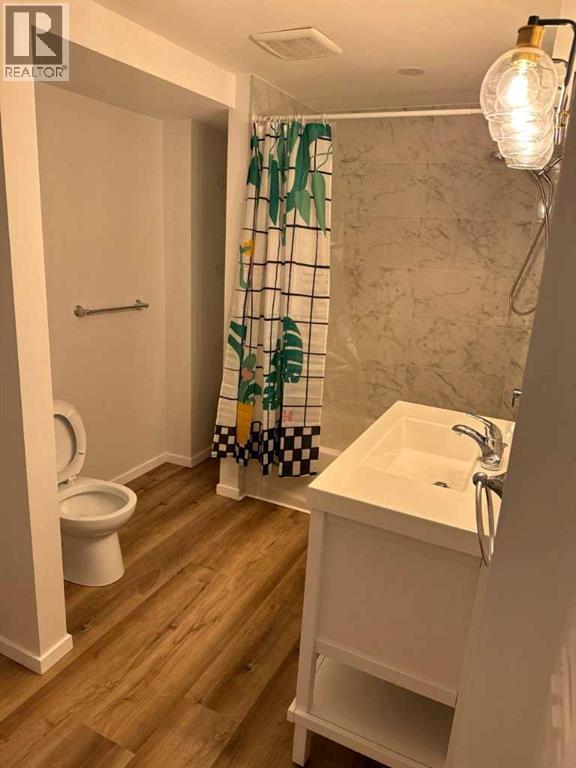 Downstair, 78 Bridleglen Manor, Calgary, Alberta  T2Y 3W9 - Photo 6 - A2288961