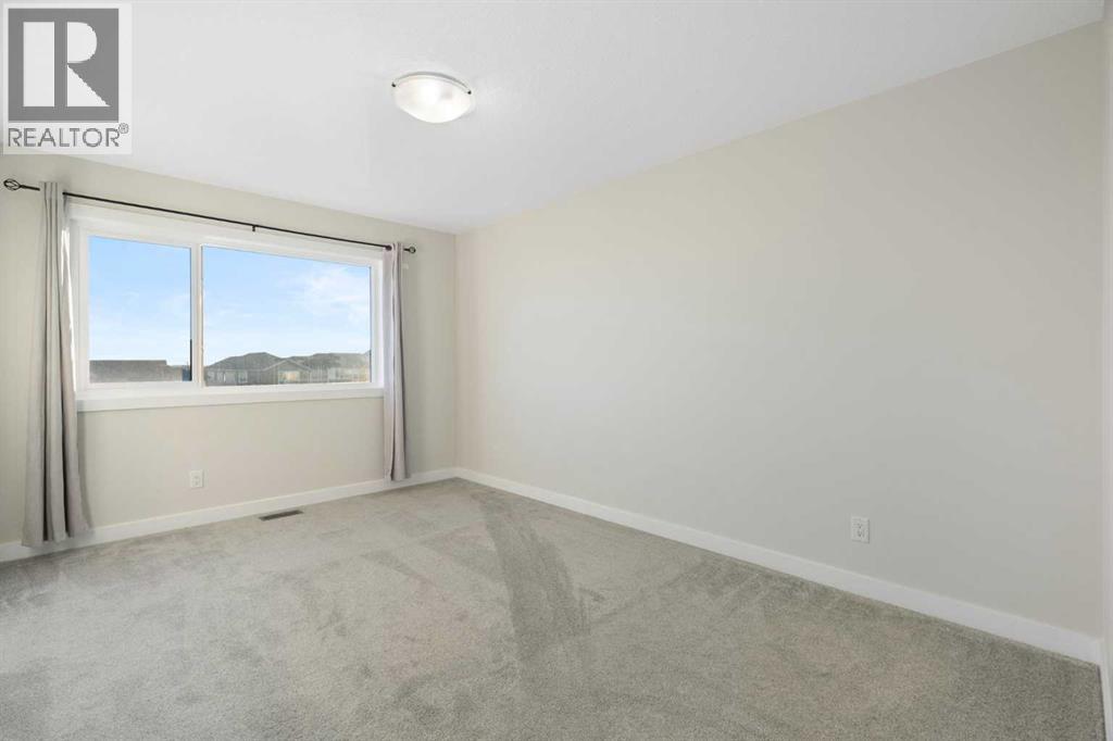 99 Edith Passage Nw, Calgary, Alberta  T3R 2B5 - Photo 34 - A2278688