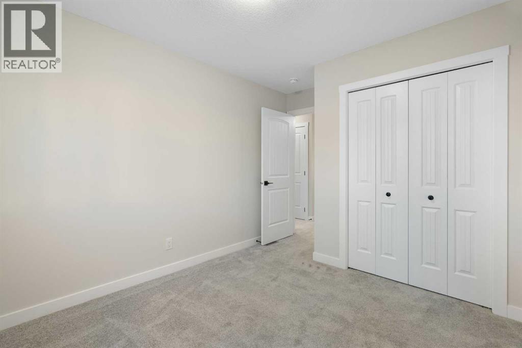 99 Edith Passage Nw, Calgary, Alberta  T3R 2B5 - Photo 33 - A2278688