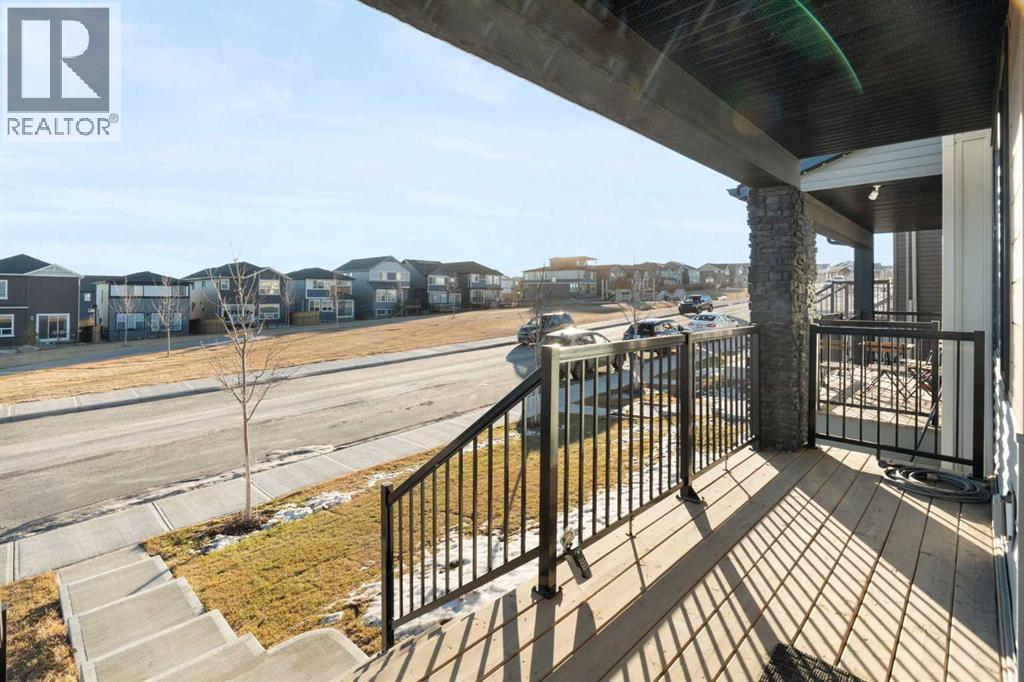 99 Edith Passage Nw, Calgary, Alberta  T3R 2B5 - Photo 5 - A2278688