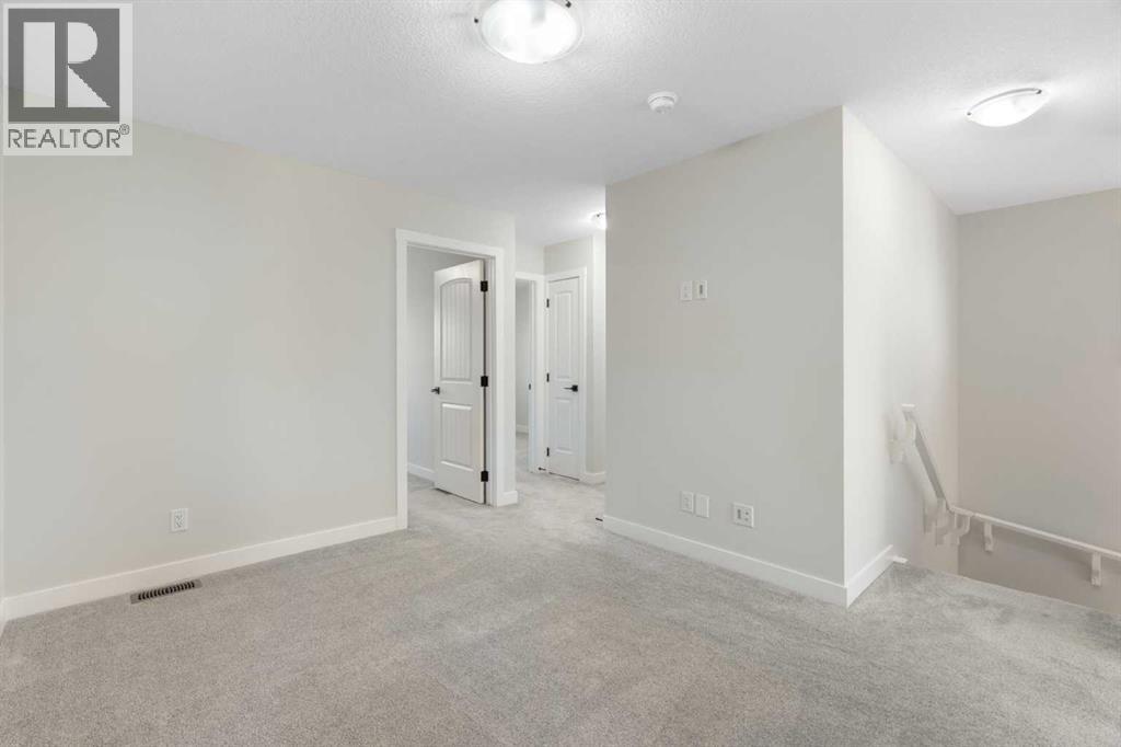 99 Edith Passage Nw, Calgary, Alberta  T3R 2B5 - Photo 25 - A2278688