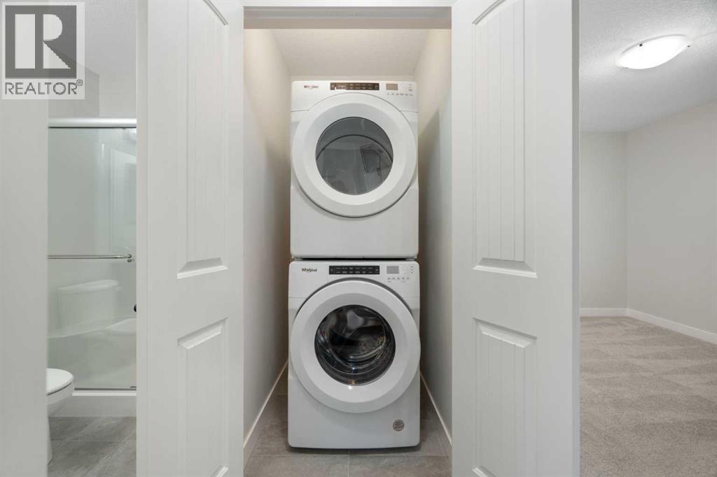 99 Edith Passage Nw, Calgary, Alberta  T3R 2B5 - Photo 28 - A2278688